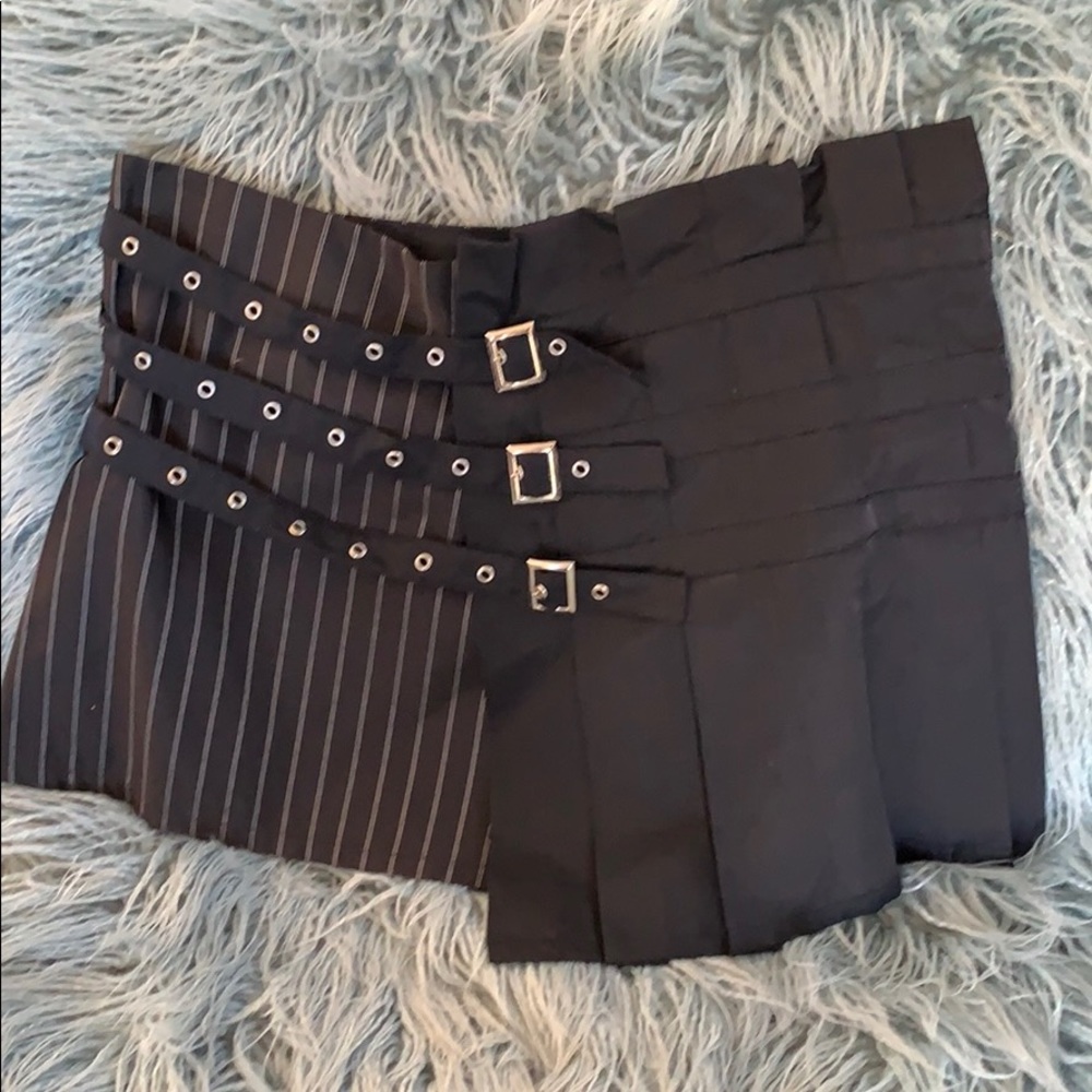 Asymmetric black mini skirt